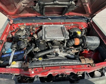 Зелений Ніссан Навара, об'ємом двигуна 2.5 л та пробігом 270 тис. км за 3650 $, фото 5 на Automoto.ua