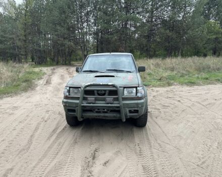 Зелений Ніссан Навара, об'ємом двигуна 2.5 л та пробігом 270 тис. км за 3650 $, фото 1 на Automoto.ua