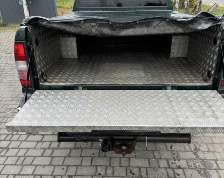 Зеленый Ниссан Навара, объемом двигателя 2.5 л и пробегом 250 тыс. км за 5300 $, фото 6 на Automoto.ua