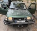 Зеленый Ниссан Навара, объемом двигателя 2.5 л и пробегом 300 тыс. км за 2000 $, фото 1 на Automoto.ua