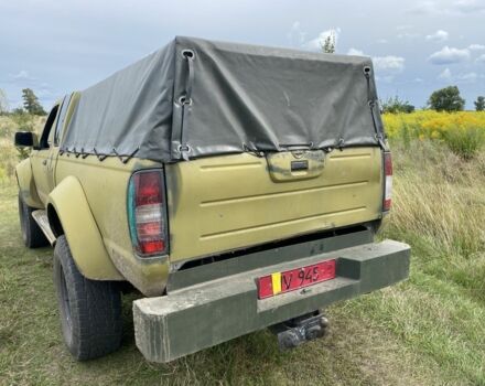 Зелений Ніссан Навара, об'ємом двигуна 2.5 л та пробігом 280 тис. км за 5300 $, фото 5 на Automoto.ua