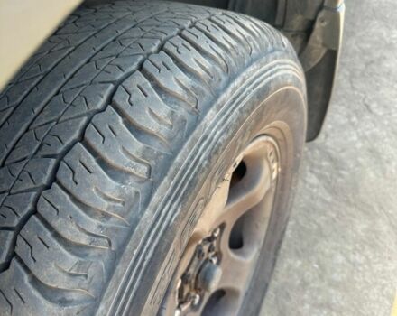 Зелений Ніссан Навара, об'ємом двигуна 2.5 л та пробігом 235 тис. км за 5462 $, фото 1 на Automoto.ua