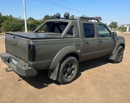 Зелений Ніссан Навара, об'ємом двигуна 2.5 л та пробігом 235 тис. км за 5462 $, фото 2 на Automoto.ua