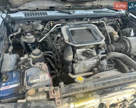 Зеленый Ниссан Навара, объемом двигателя 2.5 л и пробегом 235 тыс. км за 7000 $, фото 7 на Automoto.ua