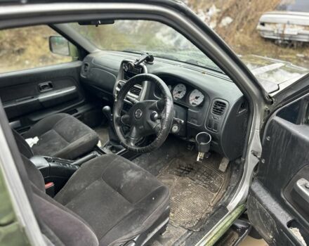 Зеленый Ниссан Навара, объемом двигателя 2.5 л и пробегом 110 тыс. км за 3750 $, фото 4 на Automoto.ua