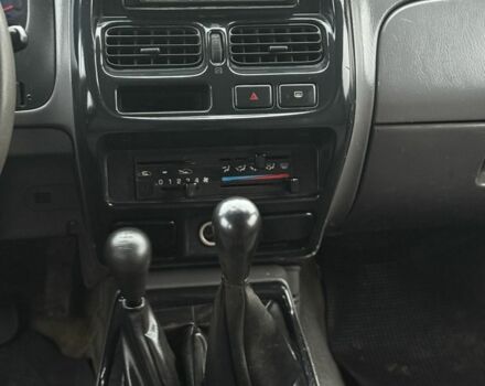 Зеленый Ниссан Навара, объемом двигателя 2.5 л и пробегом 189 тыс. км за 4200 $, фото 7 на Automoto.ua