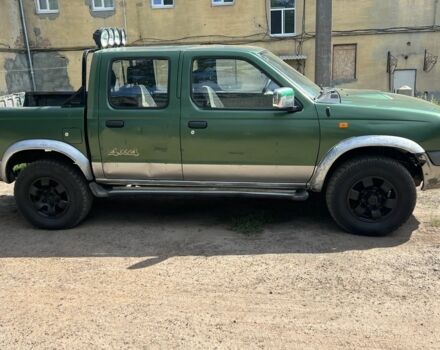 Зелений Ніссан Навара, об'ємом двигуна 2.5 л та пробігом 283 тис. км за 3500 $, фото 1 на Automoto.ua