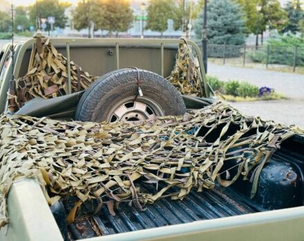 Зелений Ніссан Навара, об'ємом двигуна 2.5 л та пробігом 200 тис. км за 4200 $, фото 16 на Automoto.ua