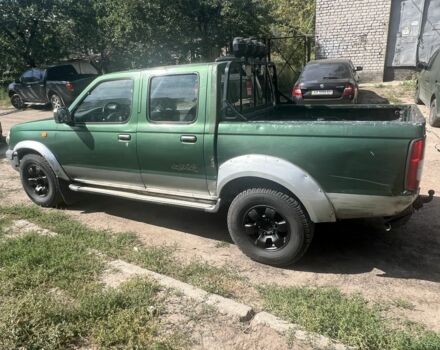 Зелений Ніссан Навара, об'ємом двигуна 2.5 л та пробігом 283 тис. км за 3500 $, фото 3 на Automoto.ua