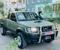 Зелений Ніссан Навара, об'ємом двигуна 2.5 л та пробігом 200 тис. км за 4200 $, фото 4 на Automoto.ua