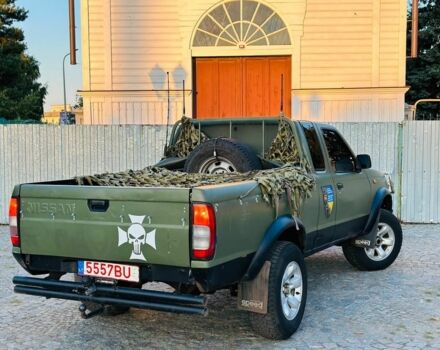 Зелений Ніссан Навара, об'ємом двигуна 2.5 л та пробігом 200 тис. км за 4200 $, фото 2 на Automoto.ua