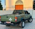 Зелений Ніссан Навара, об'ємом двигуна 2.5 л та пробігом 200 тис. км за 4200 $, фото 2 на Automoto.ua