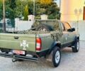 Зелений Ніссан Навара, об'ємом двигуна 2.5 л та пробігом 200 тис. км за 4200 $, фото 7 на Automoto.ua
