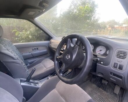 Зеленый Ниссан Навара, объемом двигателя 2.5 л и пробегом 170 тыс. км за 3900 $, фото 2 на Automoto.ua