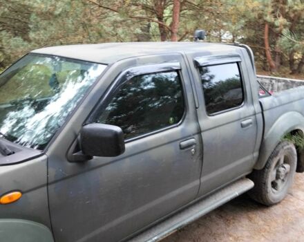 Зеленый Ниссан Навара, объемом двигателя 2.5 л и пробегом 261 тыс. км за 5001 $, фото 4 на Automoto.ua