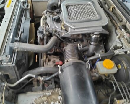 Зеленый Ниссан Навара, объемом двигателя 2.5 л и пробегом 261 тыс. км за 5001 $, фото 2 на Automoto.ua