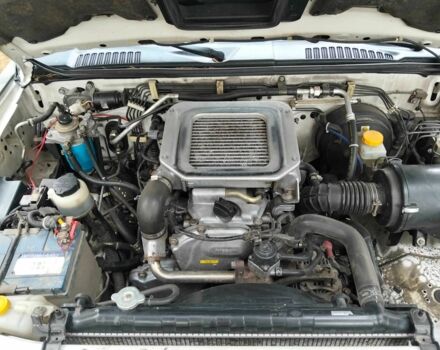 Зеленый Ниссан Навара, объемом двигателя 2.5 л и пробегом 261 тыс. км за 5001 $, фото 5 на Automoto.ua