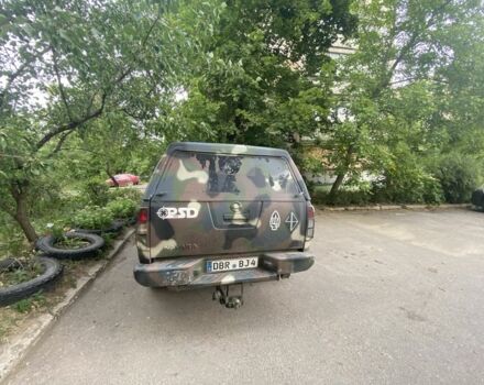 Зеленый Ниссан Навара, объемом двигателя 2.5 л и пробегом 191 тыс. км за 5500 $, фото 7 на Automoto.ua