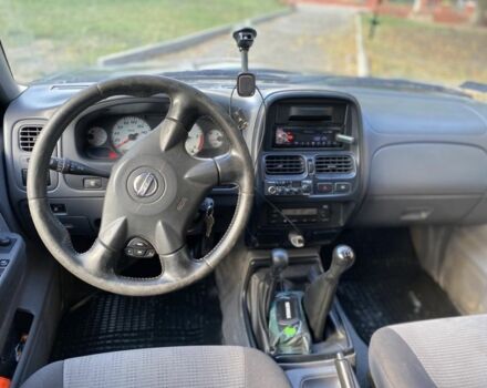 Зеленый Ниссан Навара, объемом двигателя 2.5 л и пробегом 286 тыс. км за 5200 $, фото 4 на Automoto.ua