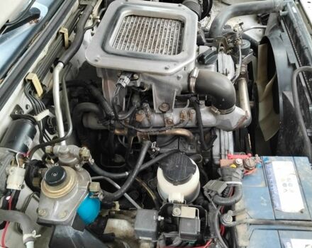 Зеленый Ниссан Навара, объемом двигателя 2.5 л и пробегом 261 тыс. км за 5001 $, фото 3 на Automoto.ua