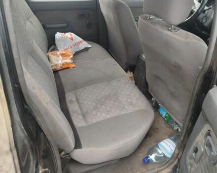 Зеленый Ниссан Навара, объемом двигателя 2.5 л и пробегом 360 тыс. км за 4500 $, фото 4 на Automoto.ua