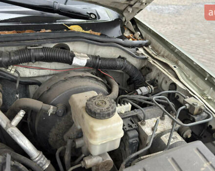 Зеленый Ниссан Навара, объемом двигателя 2.5 л и пробегом 300 тыс. км за 5800 $, фото 51 на Automoto.ua