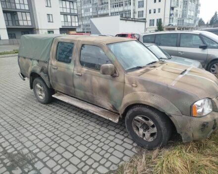 Зеленый Ниссан Навара, объемом двигателя 2.5 л и пробегом 360 тыс. км за 4500 $, фото 2 на Automoto.ua