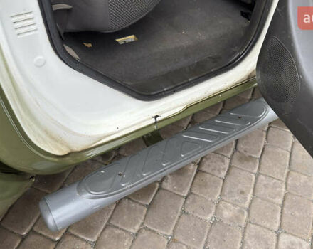 Зеленый Ниссан Навара, объемом двигателя 2.5 л и пробегом 300 тыс. км за 5800 $, фото 35 на Automoto.ua