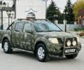 Зеленый Ниссан Навара, объемом двигателя 2.5 л и пробегом 250 тыс. км за 7254 $, фото 6 на Automoto.ua