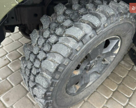 Зеленый Ниссан Навара, объемом двигателя 2.5 л и пробегом 300 тыс. км за 5800 $, фото 52 на Automoto.ua