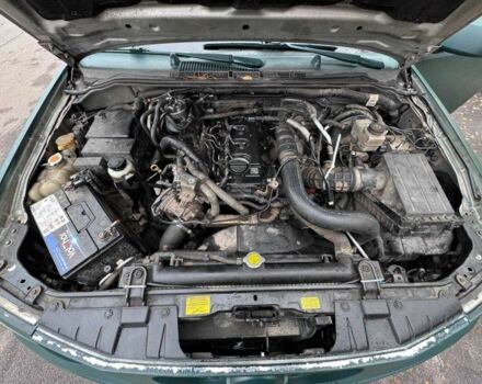 Зеленый Ниссан Навара, объемом двигателя 2.5 л и пробегом 250 тыс. км за 5999 $, фото 11 на Automoto.ua