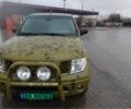 Зеленый Ниссан Навара, объемом двигателя 2.5 л и пробегом 320 тыс. км за 5228 $, фото 1 на Automoto.ua