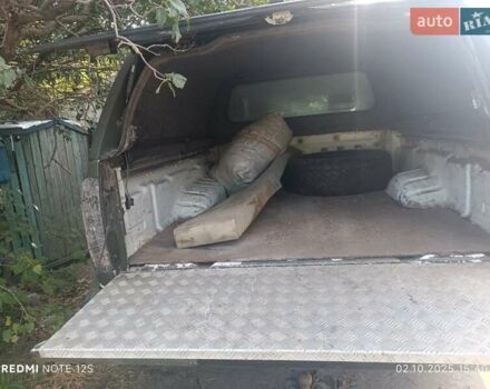 Зеленый Ниссан Навара, объемом двигателя 2.49 л и пробегом 298 тыс. км за 10000 $, фото 4 на Automoto.ua