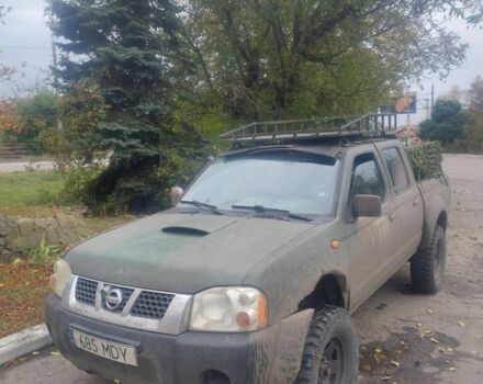 Зеленый Ниссан Навара, объемом двигателя 2.5 л и пробегом 300 тыс. км за 3500 $, фото 1 на Automoto.ua