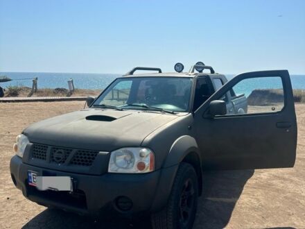 Зеленый Ниссан Навара, объемом двигателя 2.5 л и пробегом 235 тыс. км за 5444 $, фото 1 на Automoto.ua