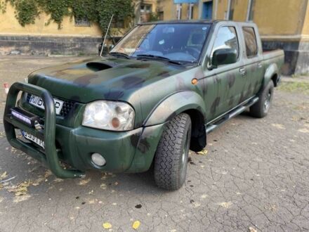 Зеленый Ниссан Навара, объемом двигателя 2.5 л и пробегом 286 тыс. км за 5200 $, фото 1 на Automoto.ua