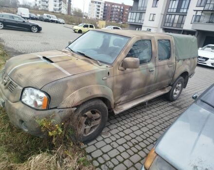 Зеленый Ниссан Навара, объемом двигателя 2.5 л и пробегом 360 тыс. км за 4500 $, фото 1 на Automoto.ua
