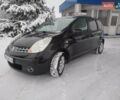 Чорний Ніссан Ноут, об'ємом двигуна 1.4 л та пробігом 190 тис. км за 5400 $, фото 8 на Automoto.ua