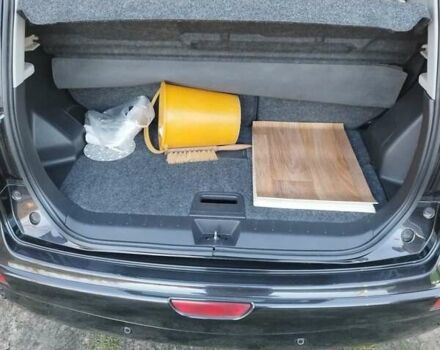 Черный Ниссан Ноут, объемом двигателя 1.4 л и пробегом 190 тыс. км за 6100 $, фото 6 на Automoto.ua