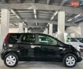 Чорний Ніссан Ноут, об'ємом двигуна 1.4 л та пробігом 125 тис. км за 6999 $, фото 7 на Automoto.ua