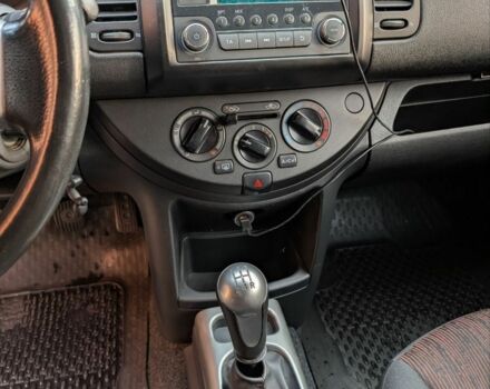 Чорний Ніссан Ноут, об'ємом двигуна 1.4 л та пробігом 127 тис. км за 6614 $, фото 1 на Automoto.ua