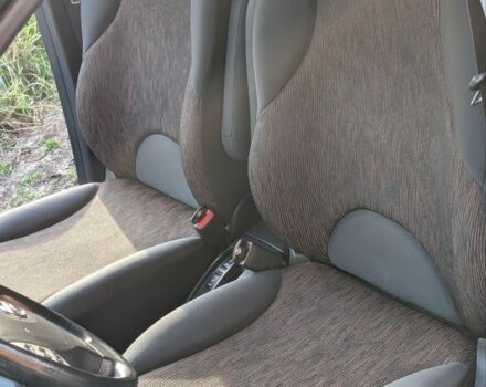 Чорний Ніссан Ноут, об'ємом двигуна 1.4 л та пробігом 127 тис. км за 6614 $, фото 6 на Automoto.ua