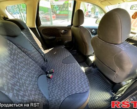 Чорний Ніссан Ноут, об'ємом двигуна 1.4 л та пробігом 150 тис. км за 4999 $, фото 5 на Automoto.ua