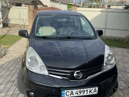 Черный Ниссан Ноут, объемом двигателя 1.4 л и пробегом 112 тыс. км за 6000 $, фото 1 на Automoto.ua