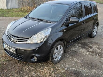 Черный Ниссан Ноут, объемом двигателя 1.4 л и пробегом 127 тыс. км за 6614 $, фото 1 на Automoto.ua