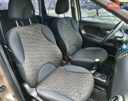 Коричневый Ниссан Ноут, объемом двигателя 1.4 л и пробегом 147 тыс. км за 5500 $, фото 24 на Automoto.ua