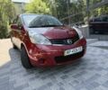 Красный Ниссан Ноут, объемом двигателя 1.4 л и пробегом 129 тыс. км за 5750 $, фото 1 на Automoto.ua