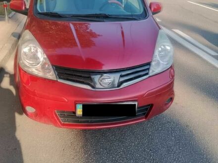Червоний Ніссан Ноут, об'ємом двигуна 1.4 л та пробігом 180 тис. км за 6095 $, фото 1 на Automoto.ua