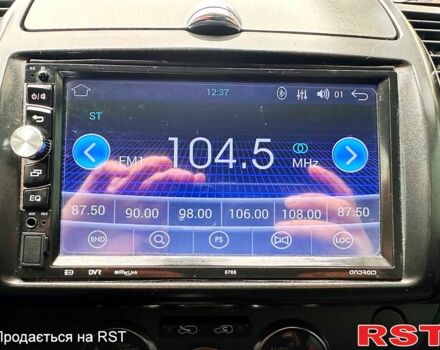 Серый Ниссан Ноут, объемом двигателя 1.4 л и пробегом 209 тыс. км за 5000 $, фото 10 на Automoto.ua