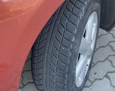 Помаранчевий Ніссан Ноут, об'ємом двигуна 1.39 л та пробігом 214 тис. км за 5400 $, фото 31 на Automoto.ua